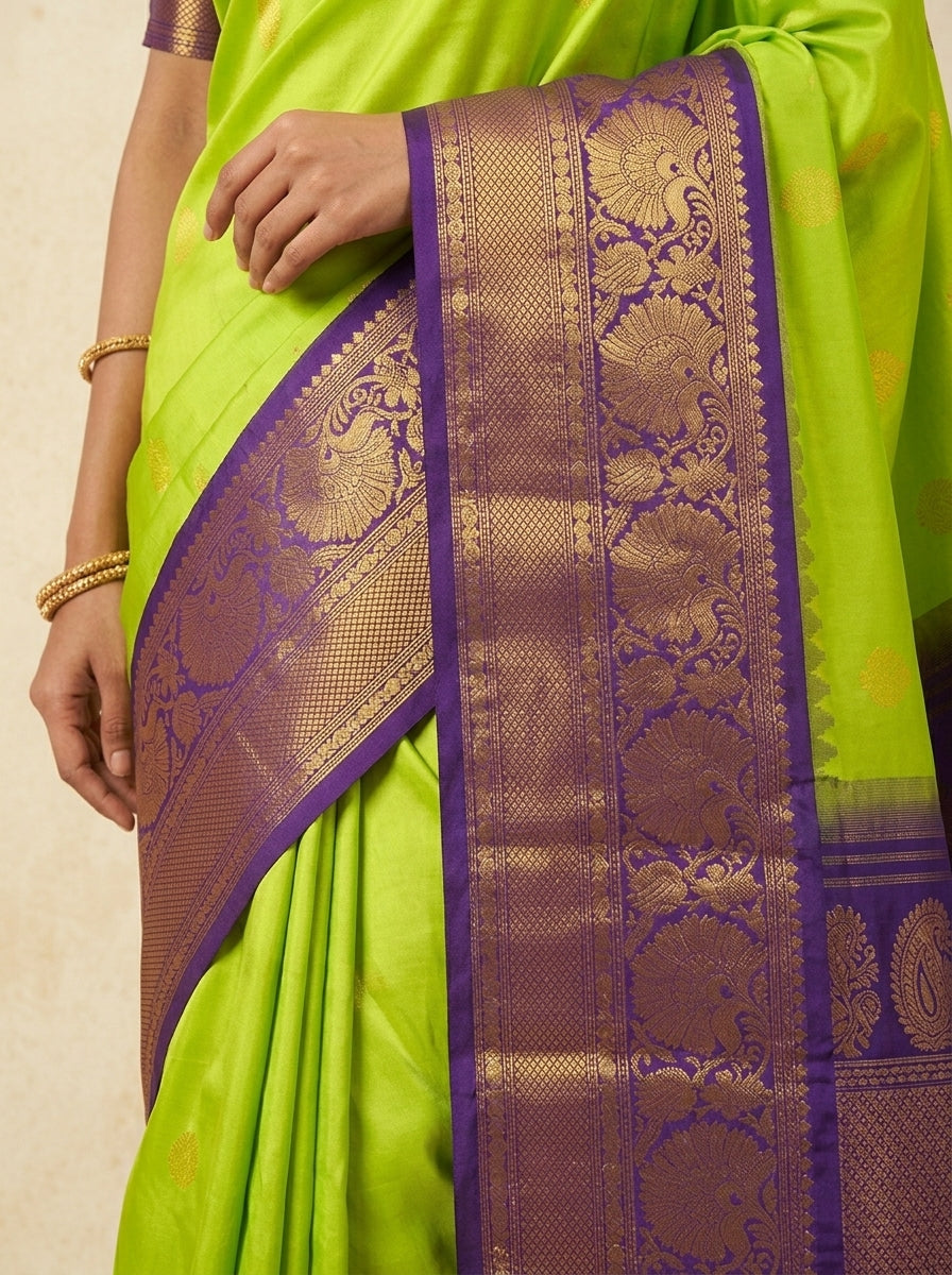 Vasantha Gadwal Pure Heavy Pattu in Parrot Green & Royal Purple with Antique Gold Zari