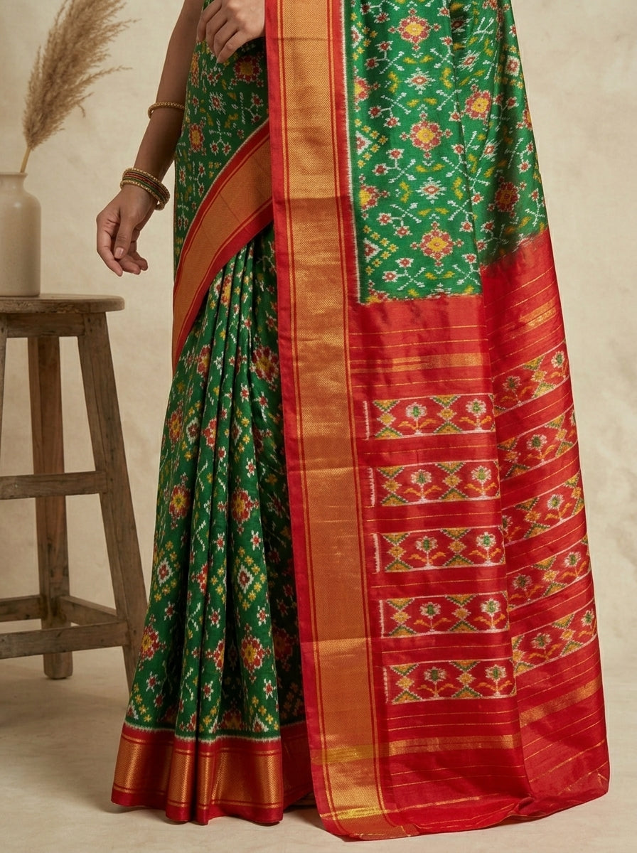 Emerald Green Ikkath Pattu Silk Saree with Vermillion Red Zari Border