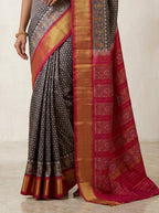Charcoal Grey Ikkath Pattu Silk Saree with Rani Pink Zari Border