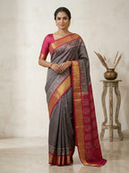 Charcoal Grey Ikkath Pattu Silk Saree with Rani Pink Zari Border