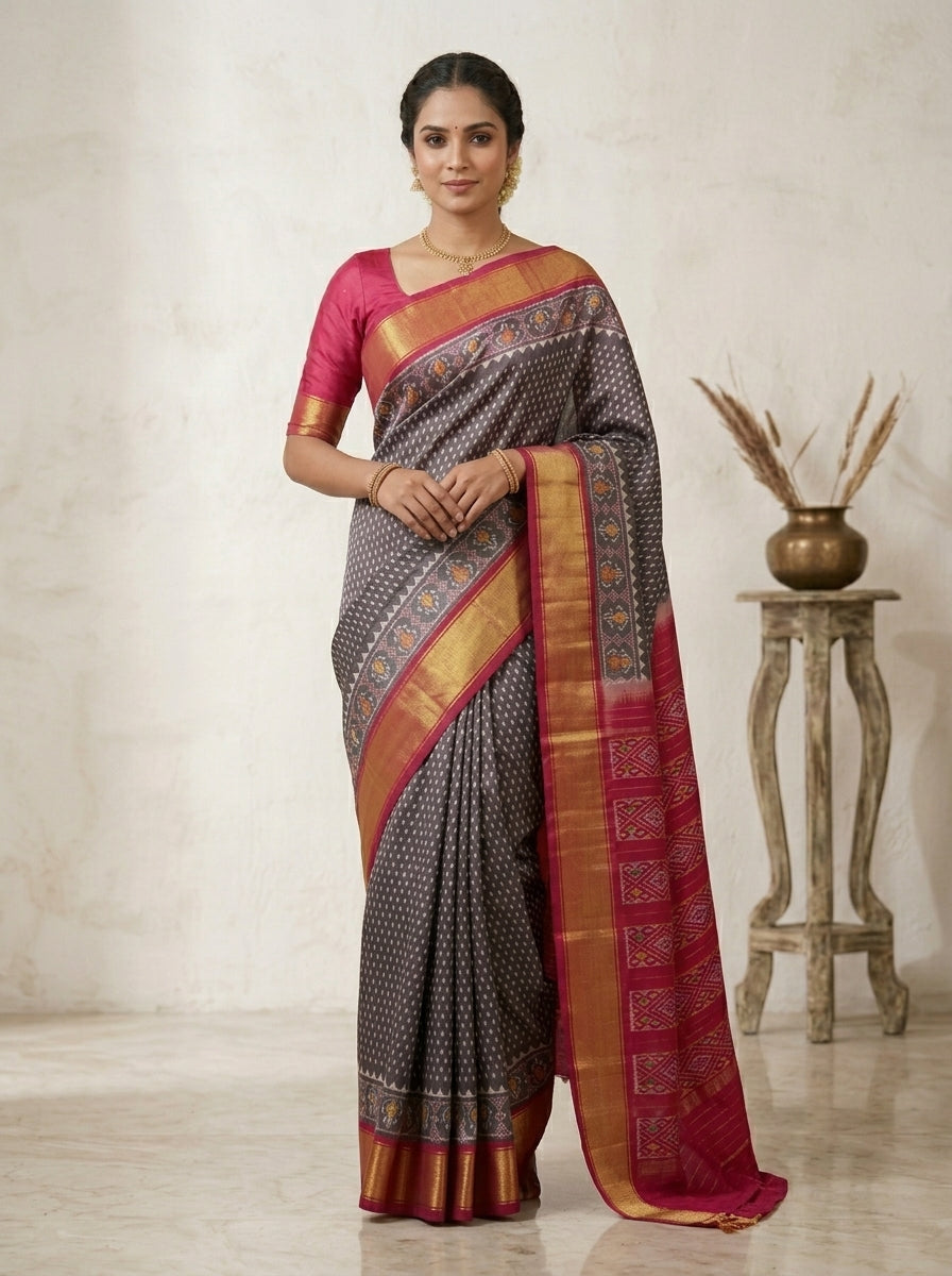 Charcoal Grey Ikkath Pattu Silk Saree with Rani Pink Zari Border